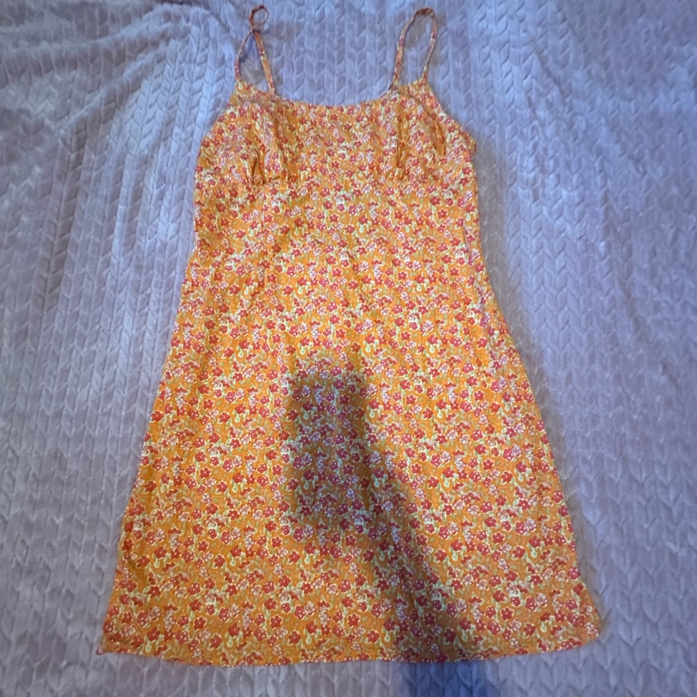 Orange with flowers dress